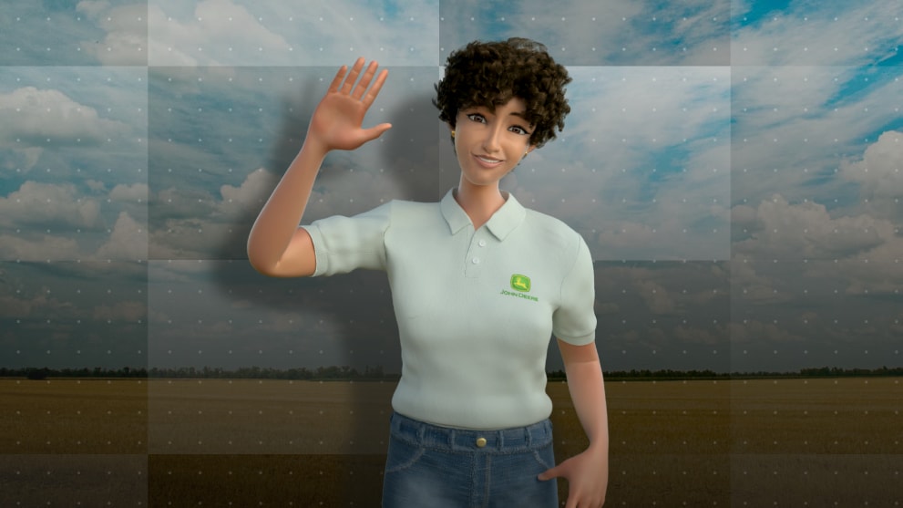 Ana Avatar lleva un polo blanco de John Deere mientras sonríe y saluda.
