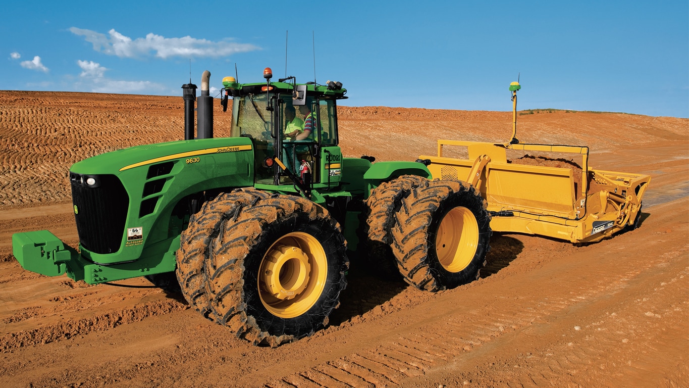 Tractor John Deere con iGrade™.